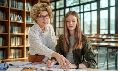 Teacher and student at school